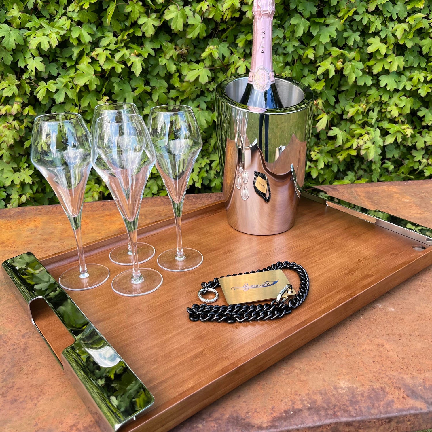 Deutz champagne with glasses and a sabrage card - champagne season